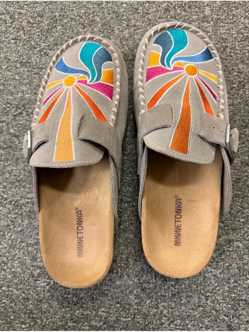 The VIRAL Minnetonka Gray Suede Clogs with Multi Color Embroidery
